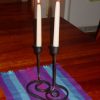 Hand forged wrought iron nestling candlesticks