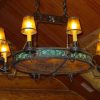 Pierced iron chandelier with mica shades and slumped glass - Rising Sun Forge